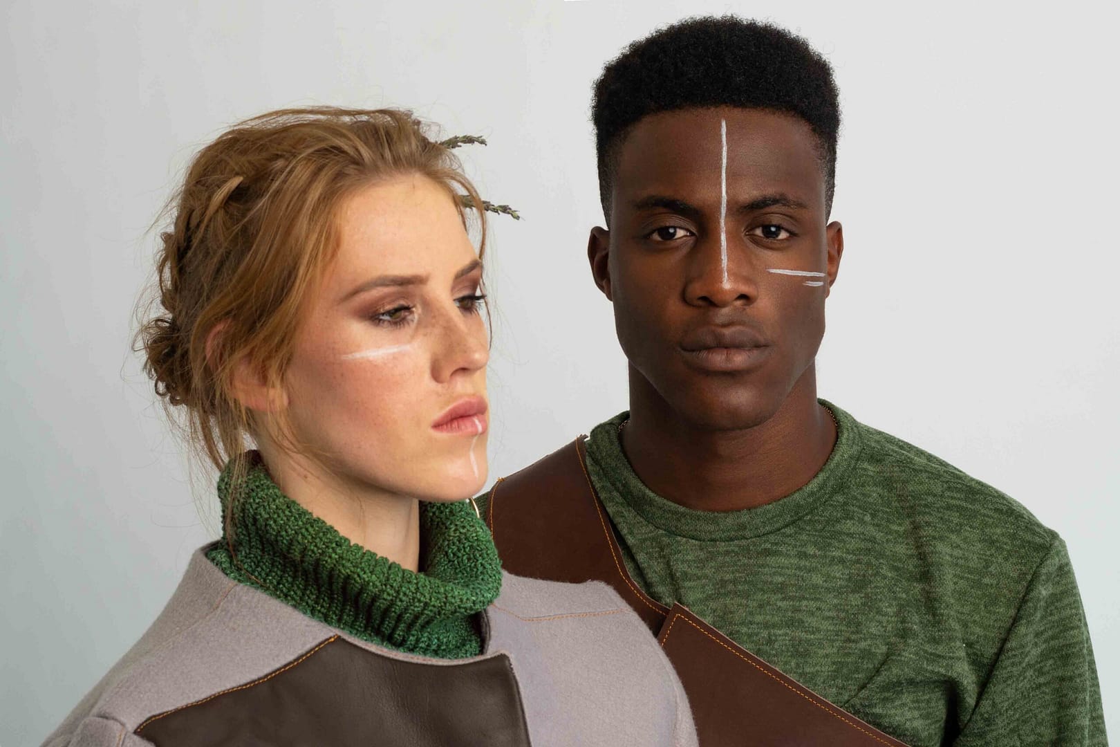 Two models headshots in designer clothing by Rustig clothing. Photographed by Stefan Venter in studio.