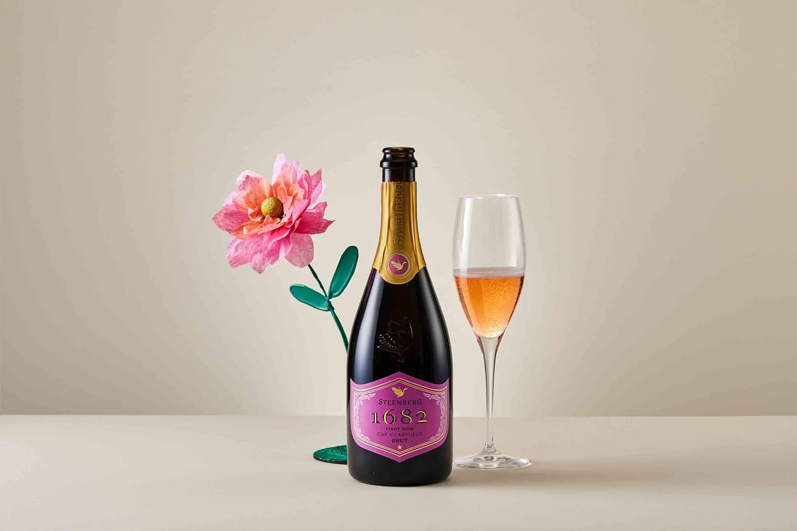 Styled wine shoot for Steenberg by Henk Hattingh and Stefan Venter in Cape Town. Stylist Lisa Perrin. Showcasing premium Constantia Cap Classique and some flowers.