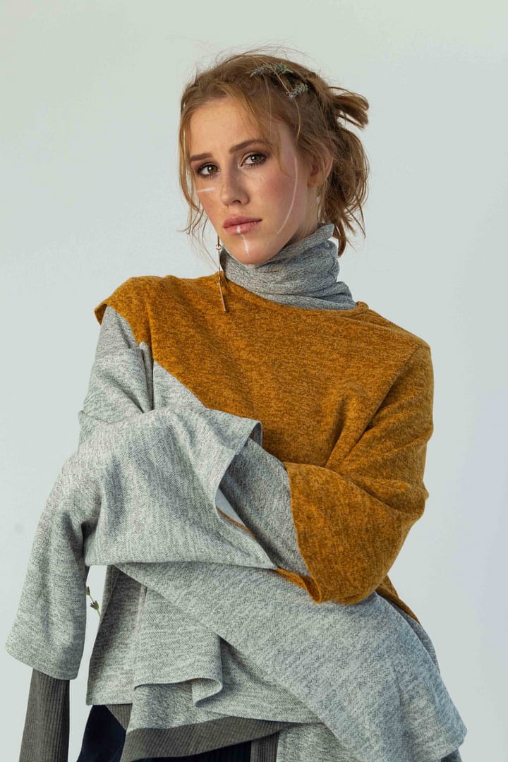 Ginger model in designer clothing by Rustig Clothing shot in studio by Stefan Venter.